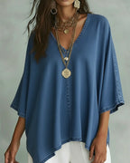 Camicetta in denim ampia con scollo a V irregolare