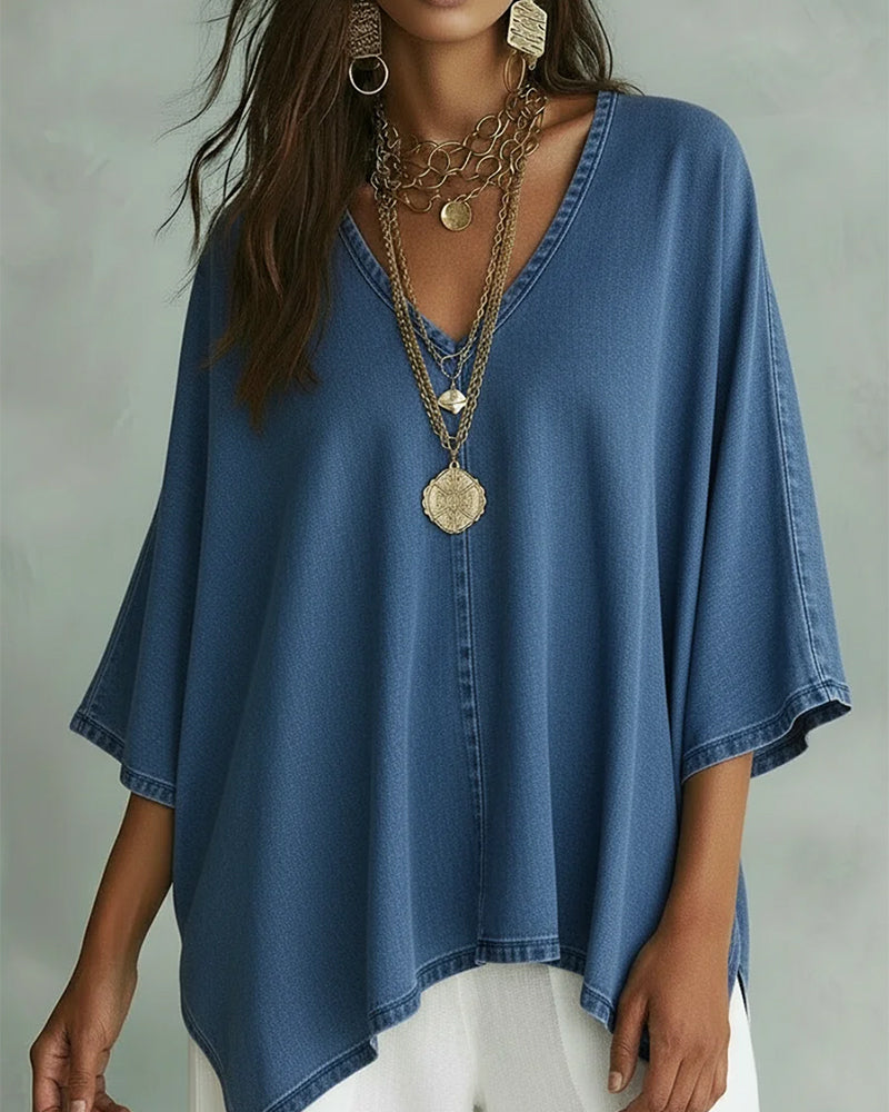 Camicetta in denim ampia con scollo a V irregolare
