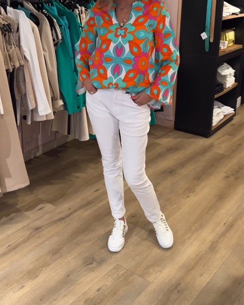 Blusa stampata ampia e versatile
