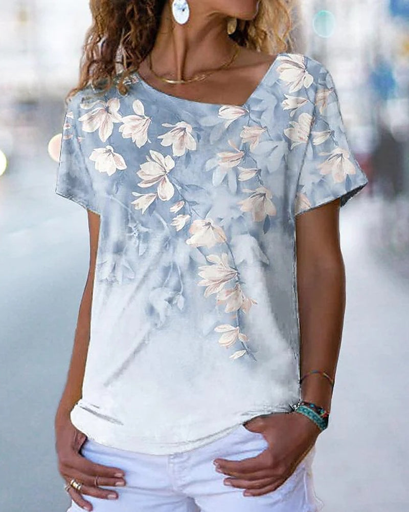 T-shirt scollo a V a fantasia floreale
