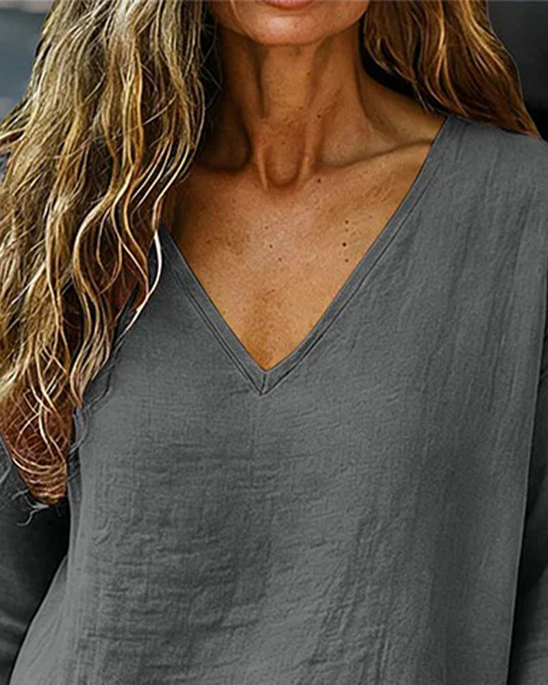 Blusa con spalle scese, scollo a V e maniche a 3/4