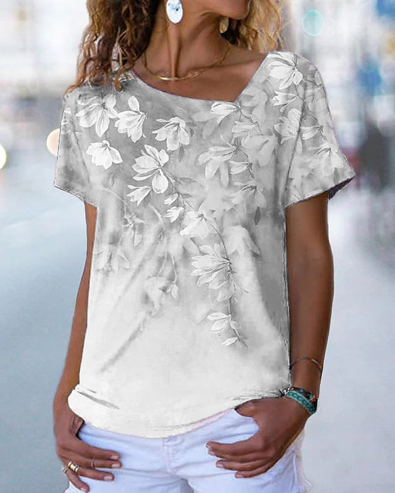 T-shirt scollo a V a fantasia floreale