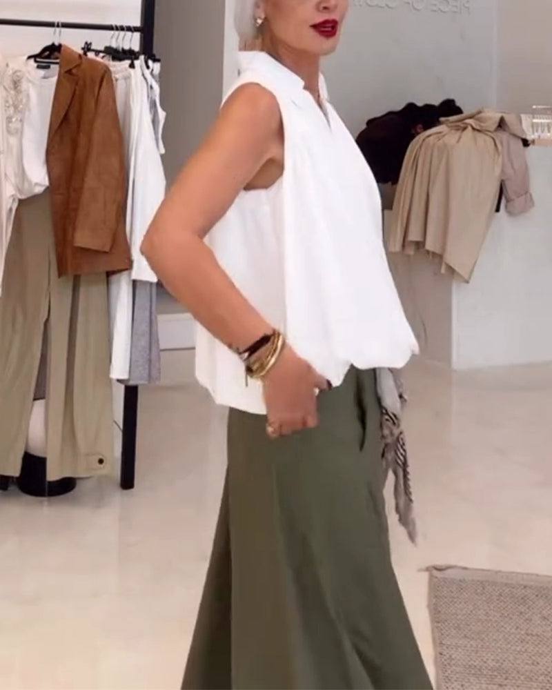 Blusa smanicata con scollo ampio
