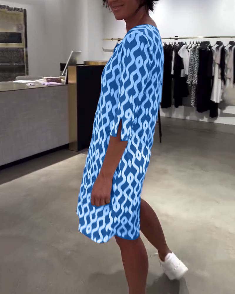 Abito midi stampato a collo alto