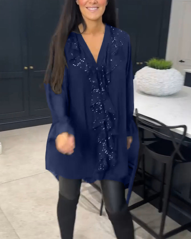Camicetta con volant e stile elegante