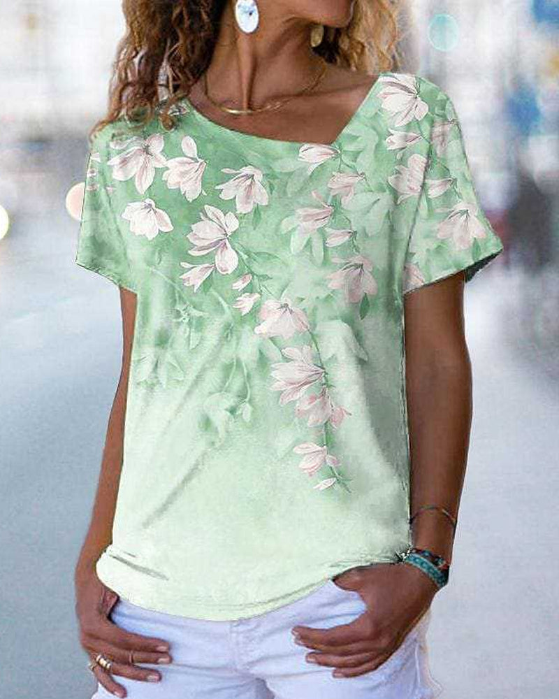 T-shirt scollo a V a fantasia floreale