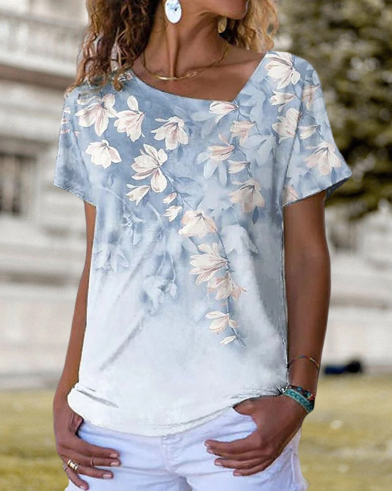 T-shirt scollo a V a fantasia floreale