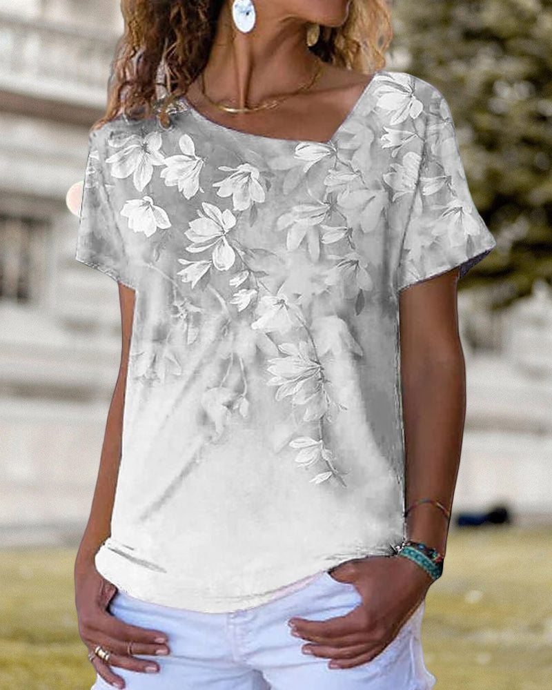 T-shirt scollo a V a fantasia floreale