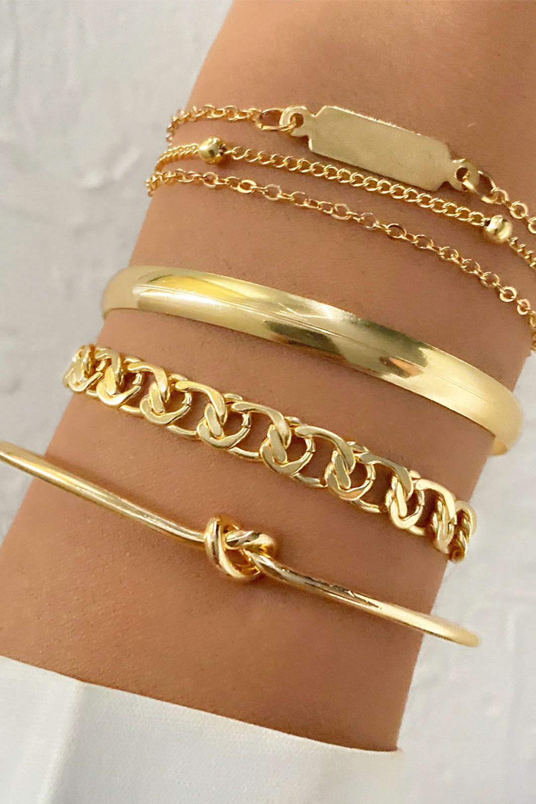 Set di bracciali a catena in metallo da 4 pezzi