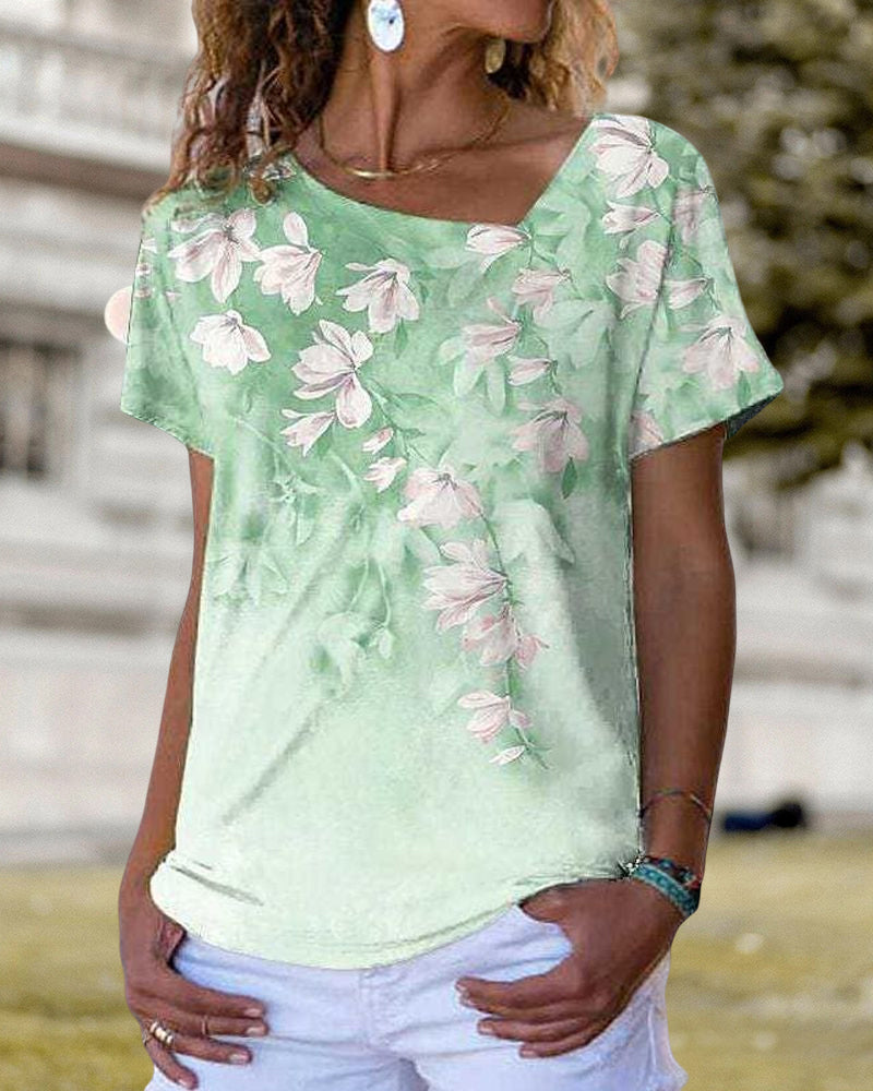 T-shirt scollo a V a fantasia floreale