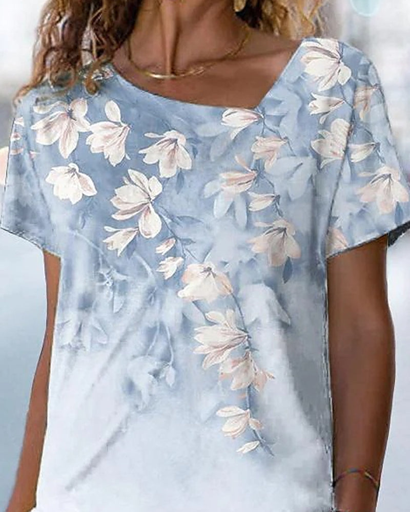 T-shirt scollo a V a fantasia floreale