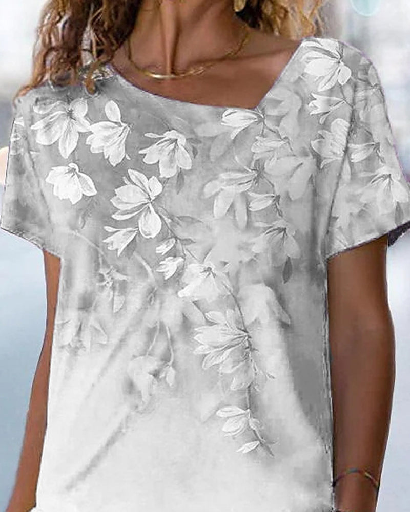 T-shirt scollo a V a fantasia floreale