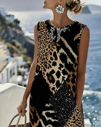 Vestito lungo senza maniche con stampa leopardata patchwork