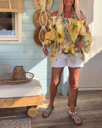 Blusa con scollo Bardot e stampa a tema resort