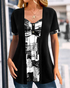 Blusa stampata finto due pezzi asimmetrica