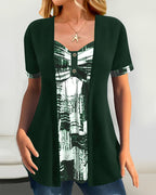 Blusa stampata finto due pezzi asimmetrica