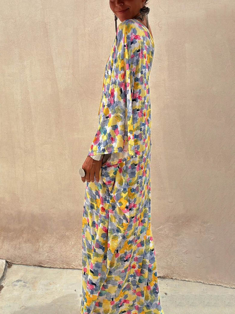 Abito lungo con stampa tie-dye e spalle scoperte per le vacanze