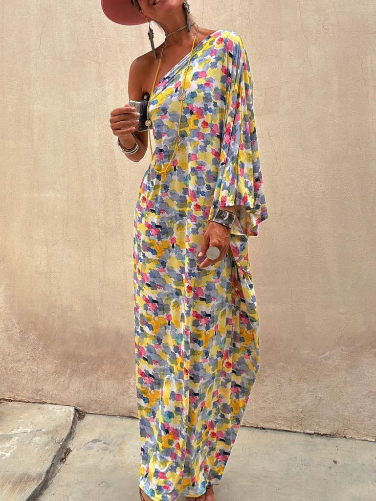 Abito lungo con stampa tie-dye e spalle scoperte per le vacanze