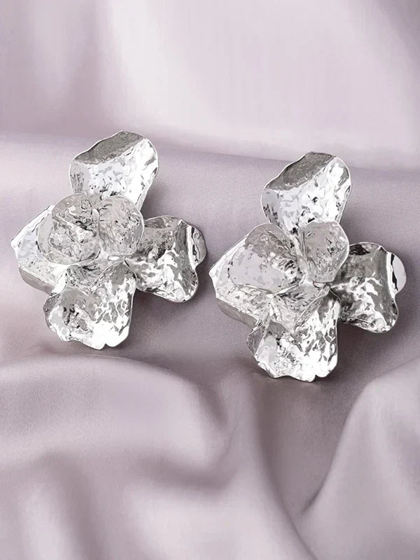 Orecchini a perno con strass a forma di fiore