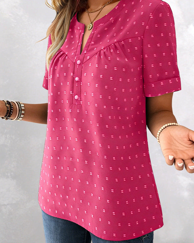 Camicetta jacquard con scollo a V, mezza abbottonatura e maniche corte