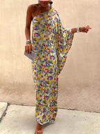 Abito lungo con stampa tie-dye e spalle scoperte per le vacanze