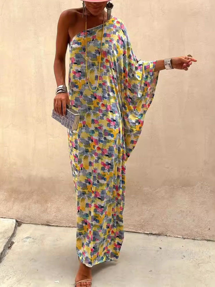 Abito lungo con stampa tie-dye e spalle scoperte per le vacanze