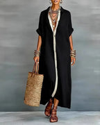 Abito chemisier elegante con collo a revers drappeggiato