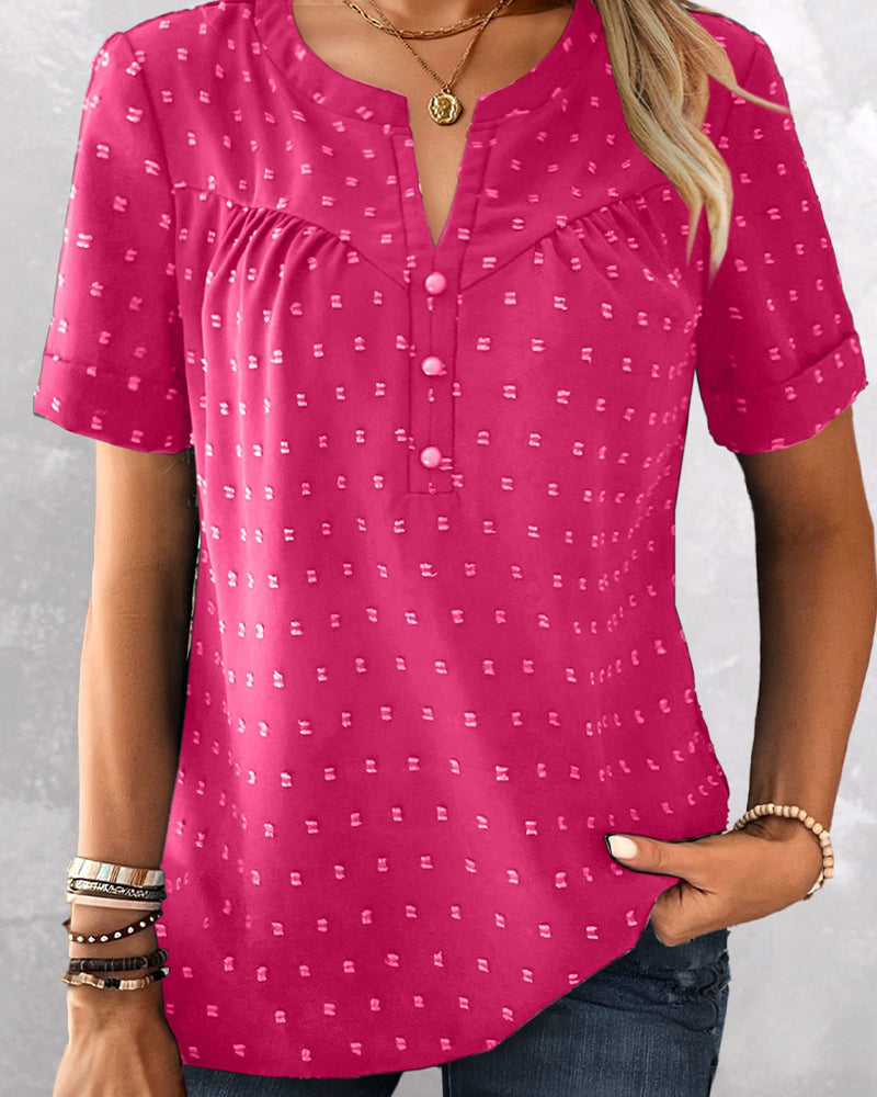 Camicetta jacquard con scollo a V, mezza abbottonatura e maniche corte