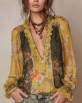 Camicetta mezza zip con stampa floreale