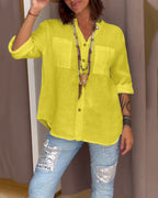 Camicia a tinta unita con tasche e bottoni semplici