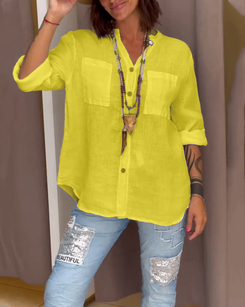Camicia a tinta unita con tasche e bottoni semplici