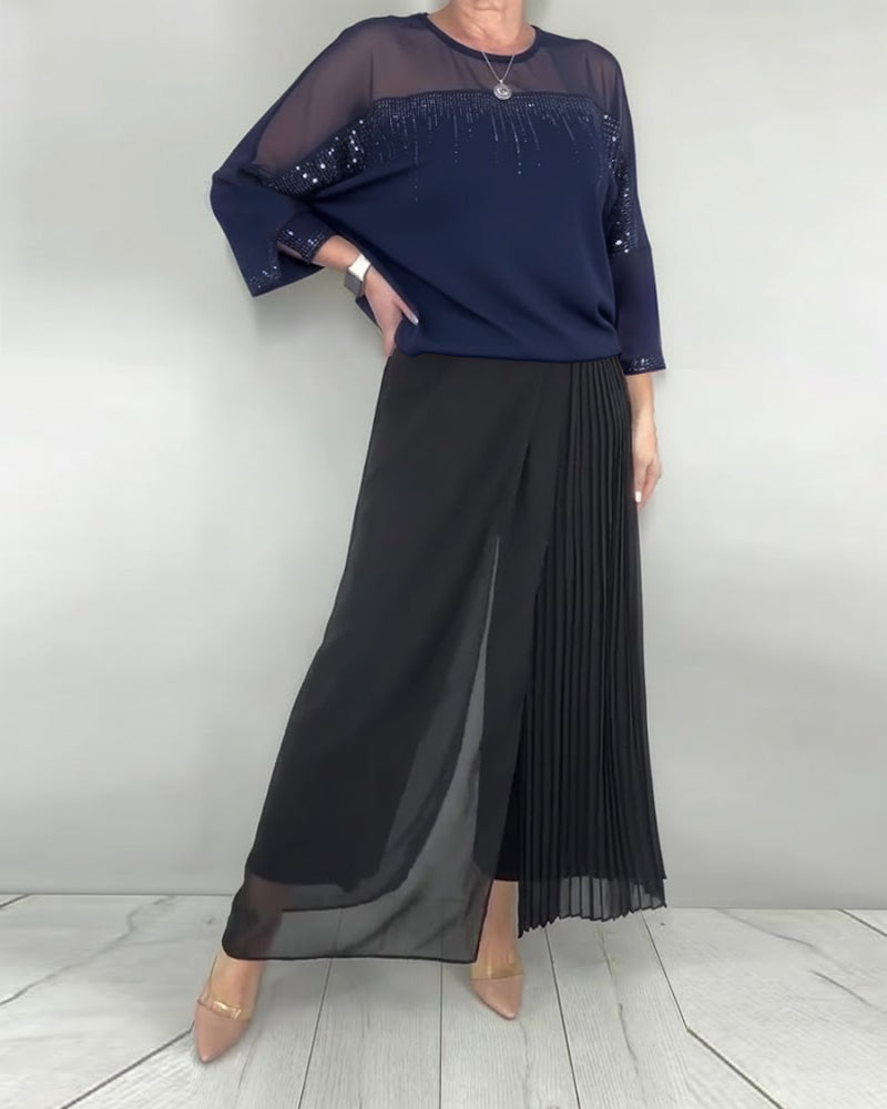 Blusa in maglia a trama larga e vestibilità ampia