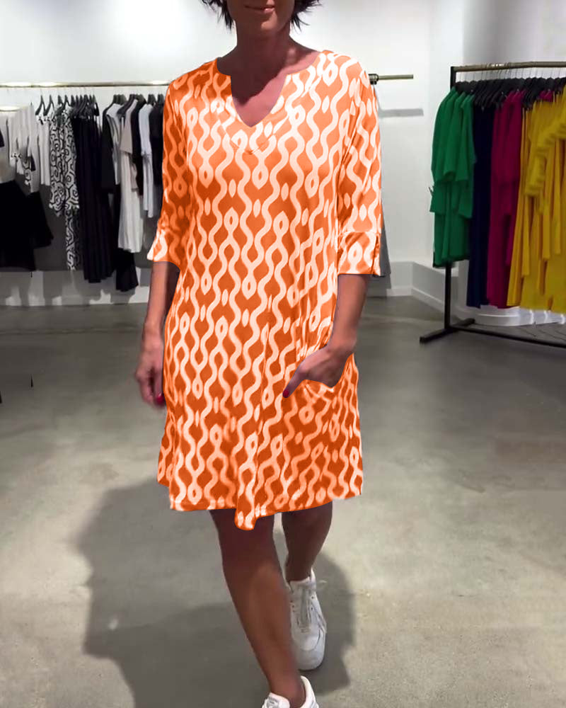 Abito midi stampato a collo alto