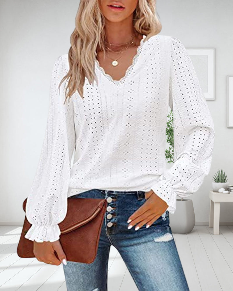 Top in pizzo a maniche lunghe con scollo a V