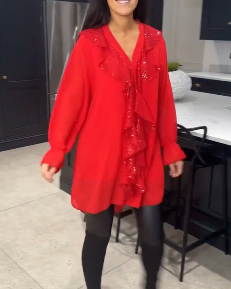 Camicetta con volant e stile elegante