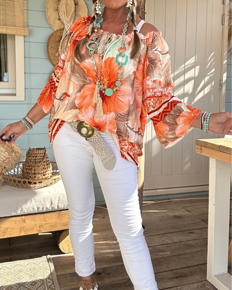 Blusa con scollo Bardot e stampa a tema resort