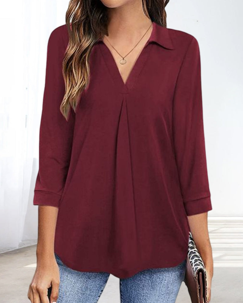 T-shirt a tinta unita con scollo a V