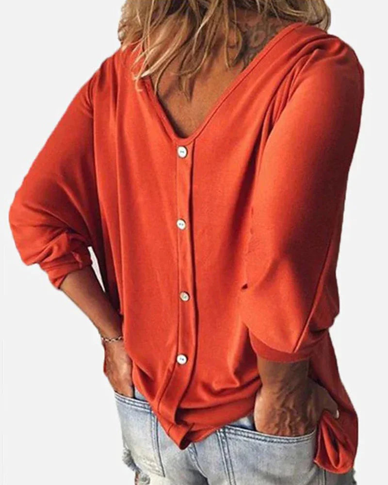 Top scollo a V abbottonato sul retro maniche a 3/4