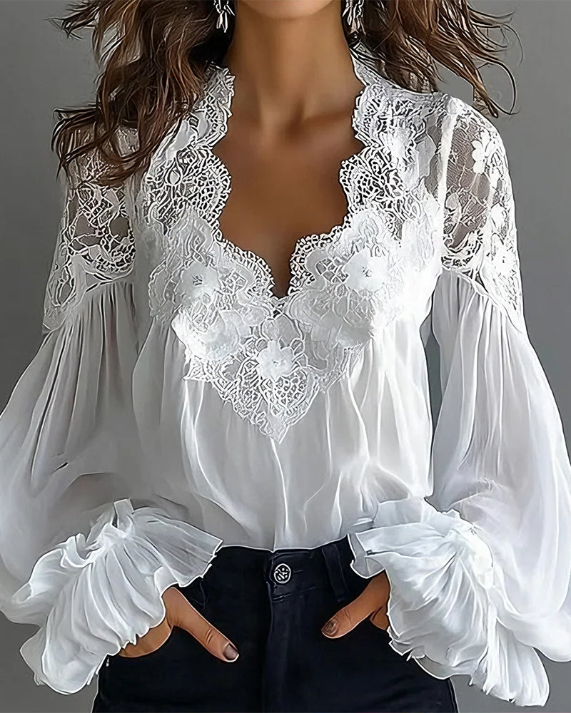 Camicetta in pizzo patchwork con scollo a V