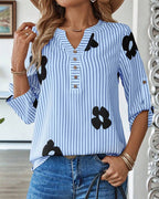Camicia a righe stampata con scollo a V alla moda
