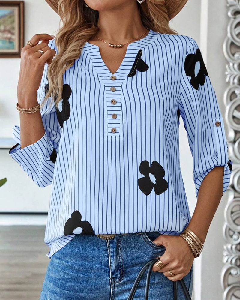 Camicia a righe stampata con scollo a V alla moda