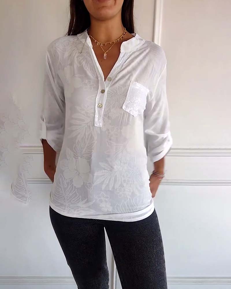 Top stampato foglie con paillettes patchwork