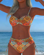 Bikini con anelli e stampa in pizzo