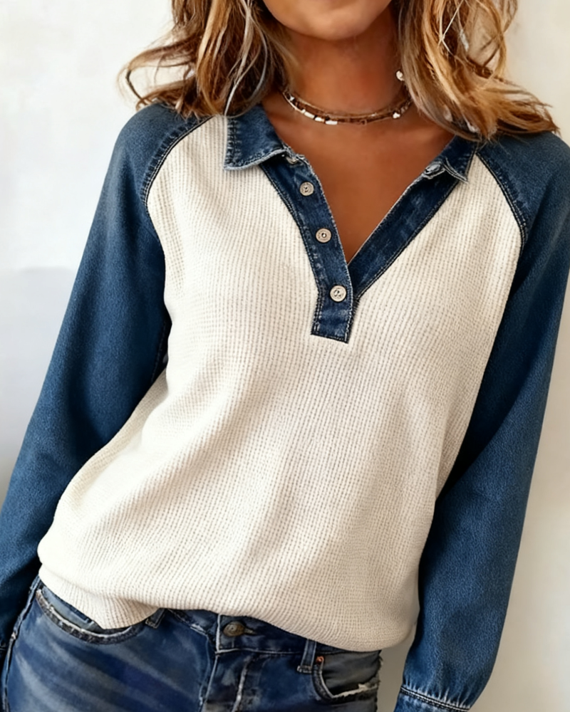 Top di tendenza con revers a contrasto