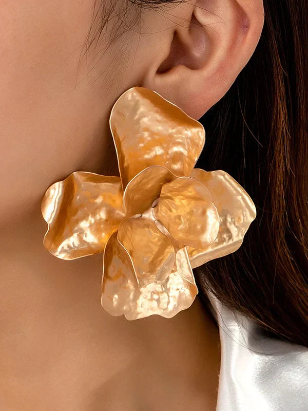 Orecchini a perno con strass a forma di fiore