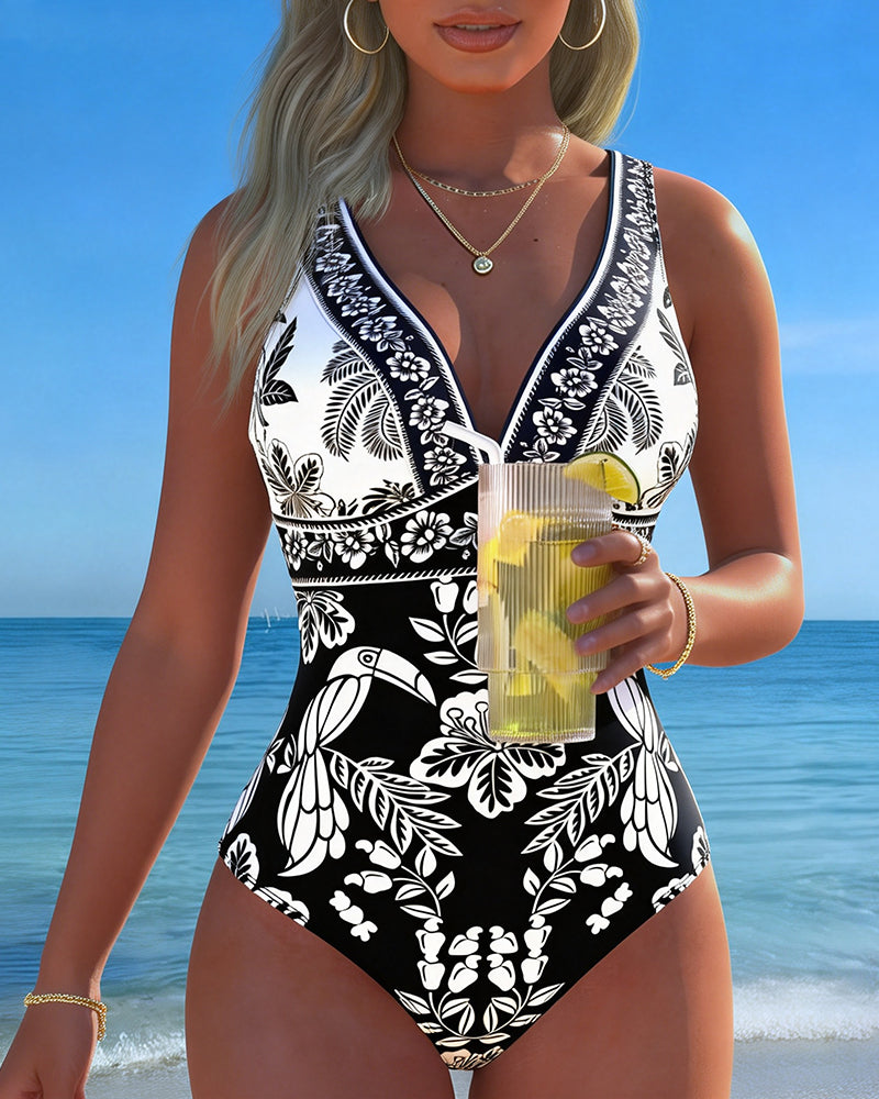Costume intero con fiori e uccelli tropicali