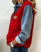 Elegante felpa con patchwork in denim a maniche lunghe
