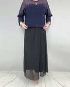 Blusa in maglia a trama larga e vestibilità ampia