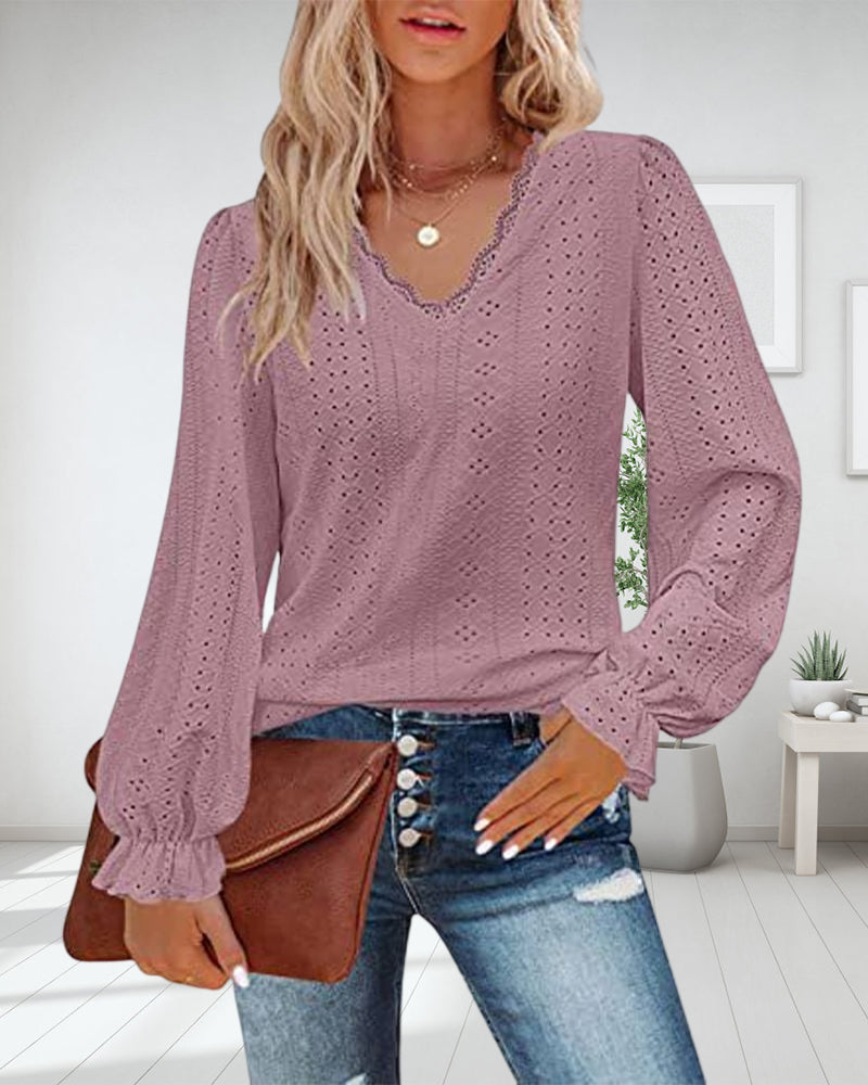 Top in pizzo a maniche lunghe con scollo a V