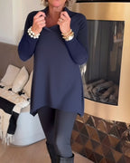 Top a collo asimmetrico a maniche lunghe